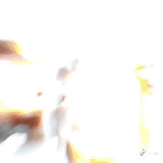 A Man In A Hat Is Standing In Front Of A White Van . GIF