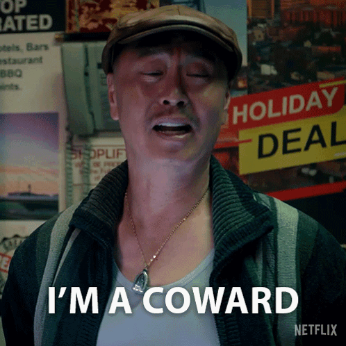A Man In A Hat Says I 'M A Coward GIF