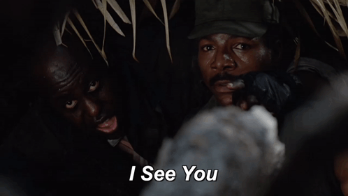 A Man In A Hat Says " I See You " To Another Man GIF
