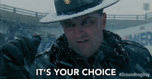 A Man In A Hat Says It 'S Your Choice In The Snow GIF
