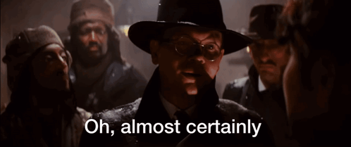 A Man In A Hat Says Oh Almost Certainly In Front Of A Group Of Men GIF