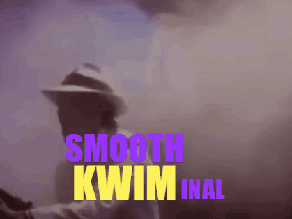 A Man In A Hat Stands In Front Of A Purple And Yellow Sign That Says Smooth Kwim Inal GIF