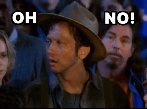A Man In A Hat With The Words Oh No We Suck Behind Him GIF