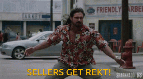 A Man In A Hawaiian Shirt Stands In Front Of A Friendly Market Sign GIF