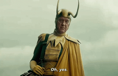 A Man In A Helmet And Cape Is Standing In Front Of A Cloudy Sky And Saying `` Oh , Yes . '' GIF