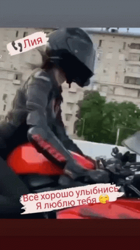 Man In Helmet Sitting On Red Motorcycle GIF