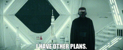 A Man In A Helmet Is Standing In A Room With The Words `` I Have Other Plans '' . GIF