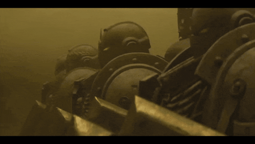 A Man In A Helmet Stands In The Water GIF