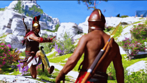 A Man In A Helmet Stands Next To Another Man GIF