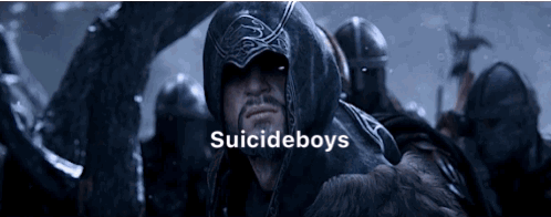 A Man In A Hood With The Words Suicideboys On The Bottom Right GIF