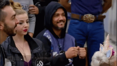 A Man In A Hooded Jacket Has The Number 50 On His Back GIF