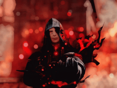 A Man In A Hooded Jacket Is Holding A Sword In His Hand GIF