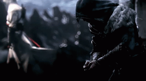 Hooded Men Standing Next To Each Other GIF
