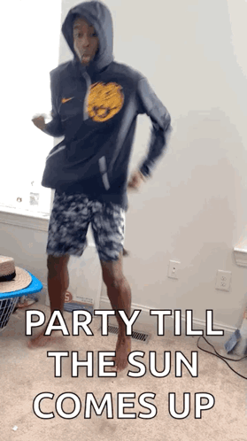 A Man In A Hoodie Is Dancing In A Room With The Words Party Till The Sun Comes Up On The Bottom GIF