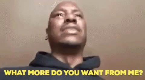 A Man In A Hoodie Is Looking Up At The Camera And Says `` What More Do You Want From Me ? '' GIF