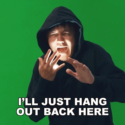 A Man In A Hoodie Is Screaming With The Words I 'Ll Just Hang Out Back Here Above Him GIF