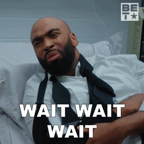 A Man In A Hospital Bed With The Words Wait Wait Wait GIF
