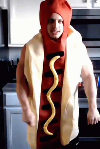 A Man In A Hot Dog Costume Is Dancing GIF