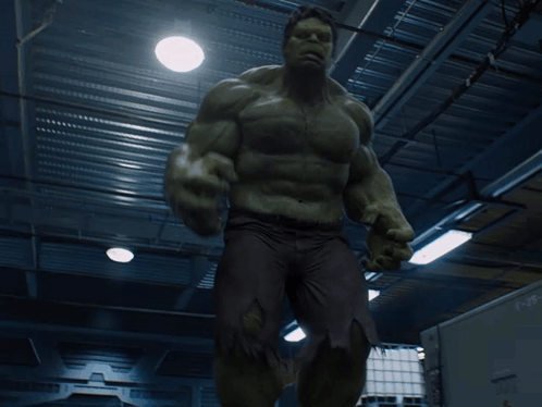 Man In Hulk Costume Standing In Room GIF
