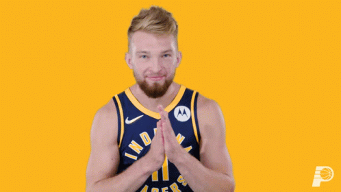 A Man In A Indiana Pacers Jersey Applauds GIF