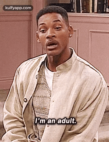 A Man In A Jacket Is Sitting Down And Saying `` I 'M An Adult . '' GIF