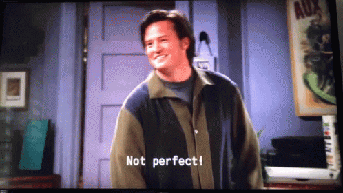 A Man In A Jacket Says " Not Perfect " On A Television Screen GIF