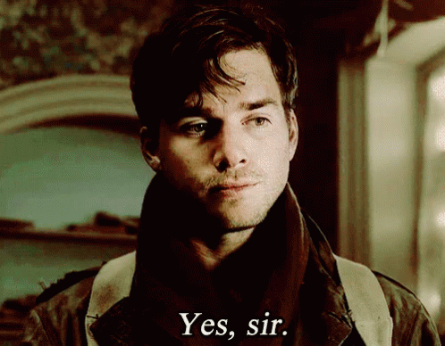 A Man In A Jacket Says Yes Sir GIF