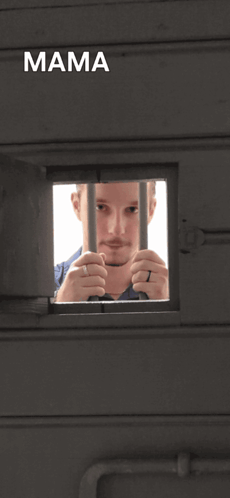 A Man In A Jail Cell With The Words Mama Im A Criminal Below Him GIF