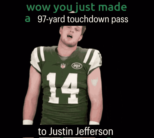 a man in a jets jersey with the number 14 on it