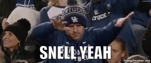 A Man In A Kentucky Hat Says Snell Yeah In A Crowd Of People GIF
