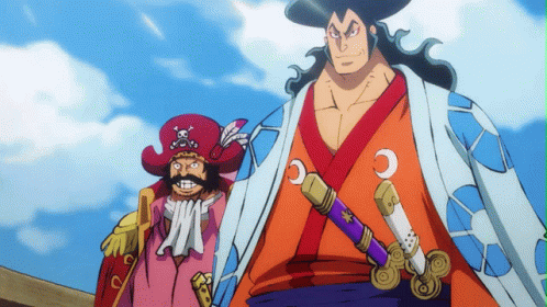 A Man In A Kimono Holds A Sword Next To A Man In A Red Hat With A Skull And Crossbones On It GIF