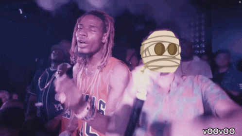 A Man In A Kings Jersey Stands Next To Another Man With A Mummy Mask On His Face GIF