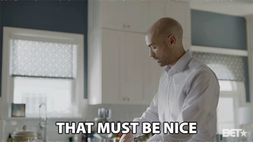 A Man In A Kitchen With The Words That Must Be Nice Below Him GIF