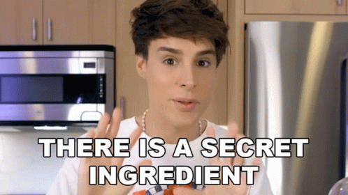 A Man In A Kitchen With The Words " There Is A Secret Ingredient " Above Him GIF