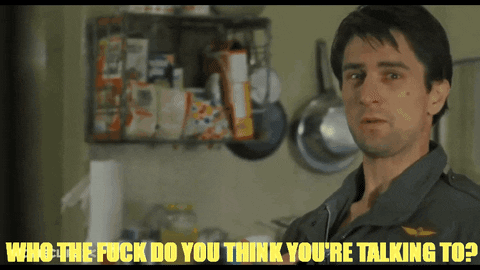 A Man In A Kitchen With The Words Who The Fuck Do You Think You 'Re Talking To Below Him GIF