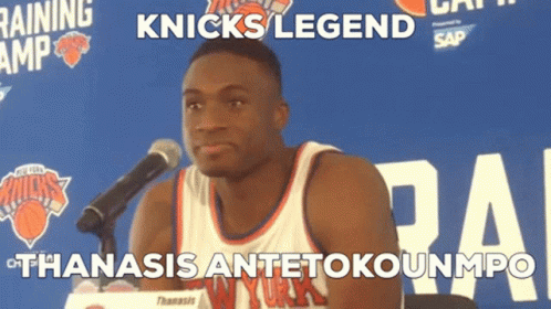 A Man In A Knicks Jersey Stands In Front Of A Microphone With The Caption Knicks Legend GIF