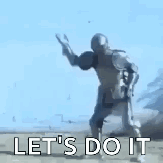 A Man In A Knight 'S Helmet Is Dancing On A Beach . GIF