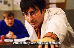 A Man In A Lab Coat And Glasses Says Houston We Have An Idiot GIF