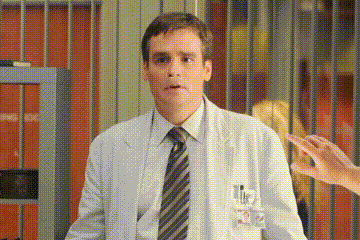 A Man In A Lab Coat And Tie Has A Name Tag On His Chest That Says ' L.i.p. ' GIF