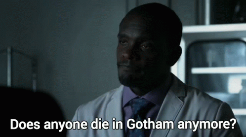 A Man In A Lab Coat And Tie Is Asking If Anyone Die In Gotham Anymore GIF