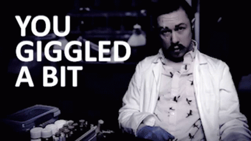 A Man In A Lab Coat With The Words You Giggled A Bit Above Him GIF