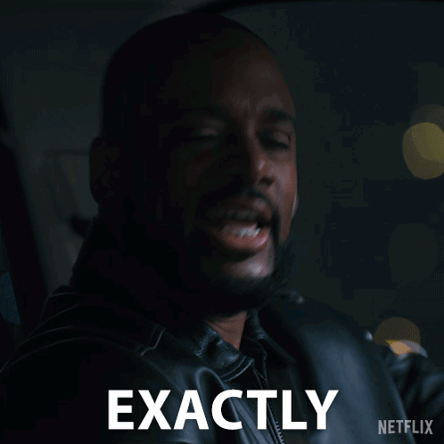 A Man In A Leather Jacket Is Making A Face With The Word Exactly Above Him GIF