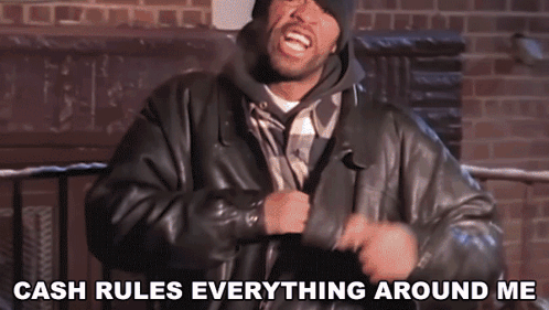 A Man In A Leather Jacket Is Saying " Cash Rules Everything Around Me " GIF