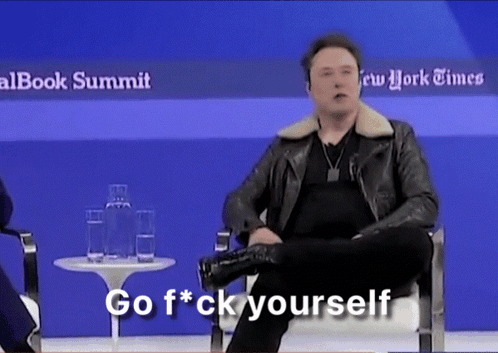 A Man In A Leather Jacket Is Sitting In Front Of A Sign That Says " Go F * Ck Yourself " GIF