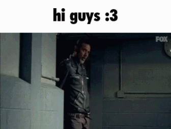 A Man In A Leather Jacket Is Standing In A Doorway With The Words Hi Guys 3 Above Him GIF