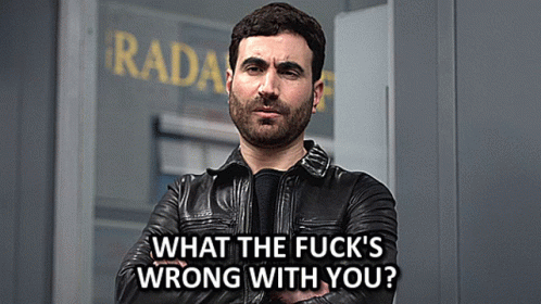 A Man In A Leather Jacket Is Standing In Front Of A Radar Sign GIF