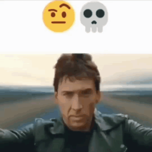 A Man In A Leather Jacket Is Taking A Selfie With A Skull And Smiley Face . GIF