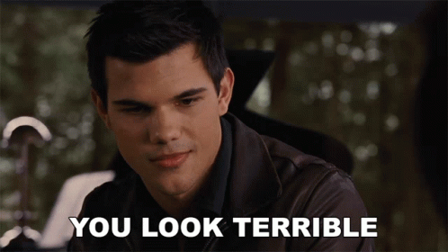 A Man In A Leather Jacket With The Words You Look Terrible Below Him GIF