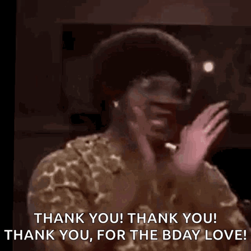 A Man In A Leopard Print Shirt Is Dancing With His Hands In The Air And Saying Thank You ! GIF