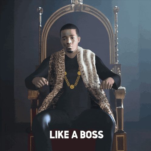 A Man In A Leopard Print Vest Is Sitting On A Throne With The Caption Like A Boss GIF
